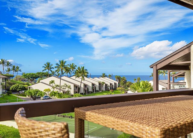 View from the balcony of blue sky and distant ocean - Maui waterfalls