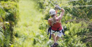 Woman going on a jungle maui zipline adventure