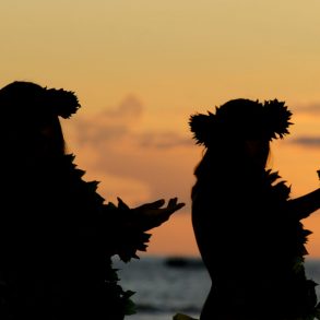 Hawaiian girls dancing the hula at sunset at Te Au Moana Show