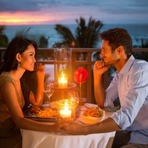 Romantic couple have dinner during their Maui Honeymoon