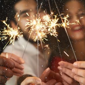 Friends with sparklers for New Years Eve on Maui