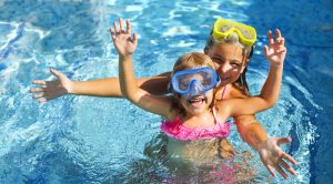 Girls swimming at their Maui Mermaid Adventure