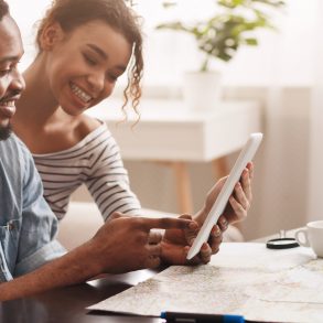 Couple planning a virtual vacation to Maui