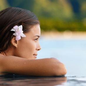 Woman in the pool, one of the best ways to stay cool on Maui this summer