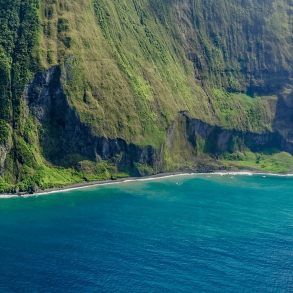Maui ocean water surrounded by mountains