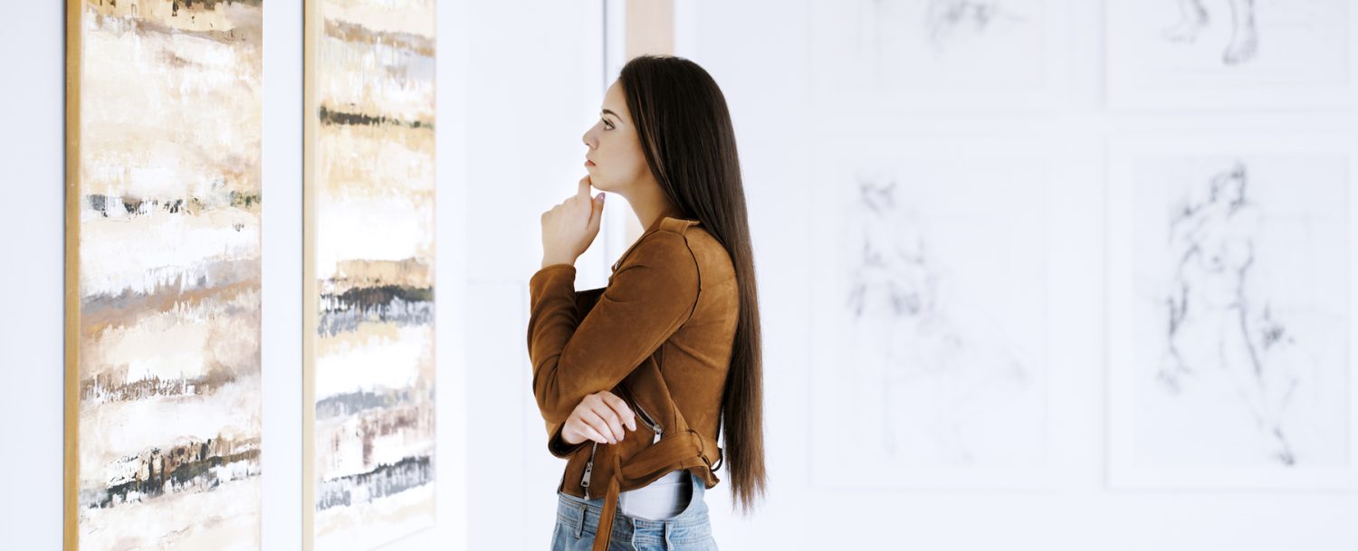 Woman Viewing Art at a Maui Art Gallery