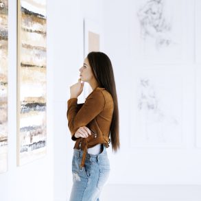 Woman Viewing Art at a Maui Art Gallery