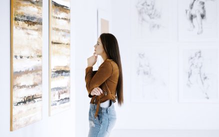 Woman Viewing Art at a Maui Art Gallery
