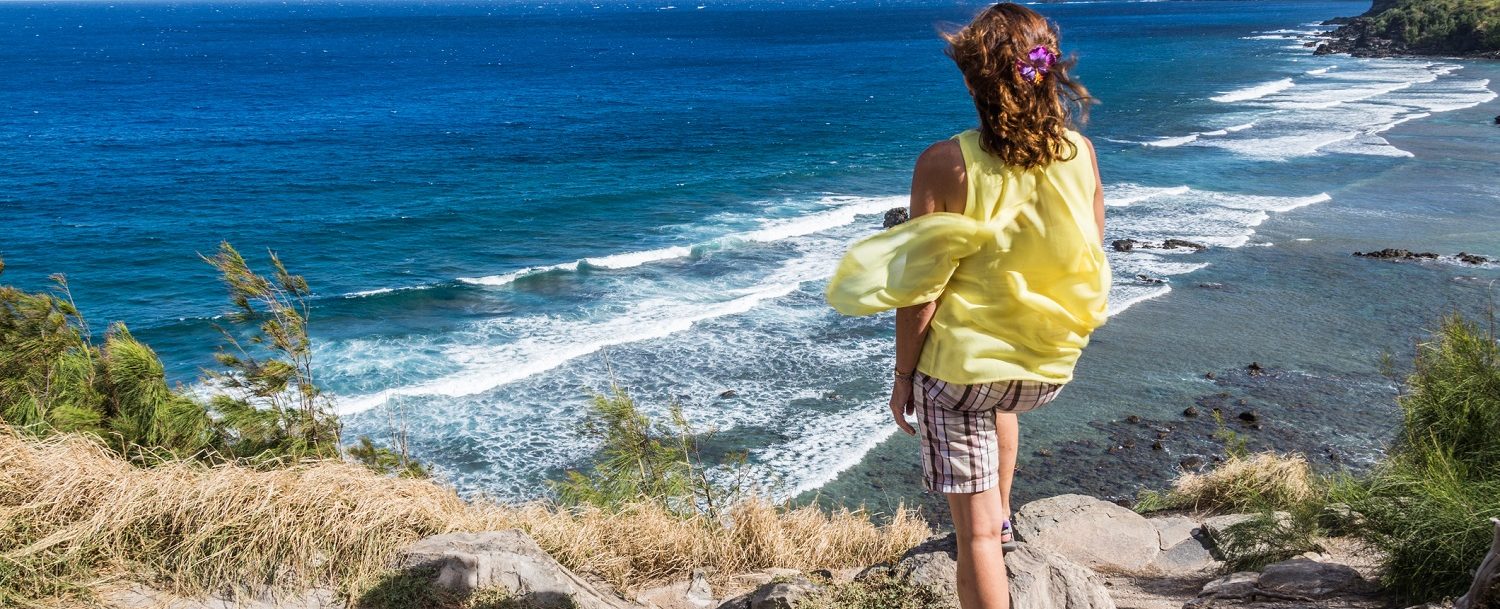 Female sightseeing at a beach on a Maui weekend getaway