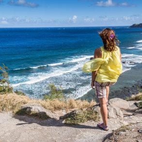 Female sightseeing at a beach on a Maui weekend getaway